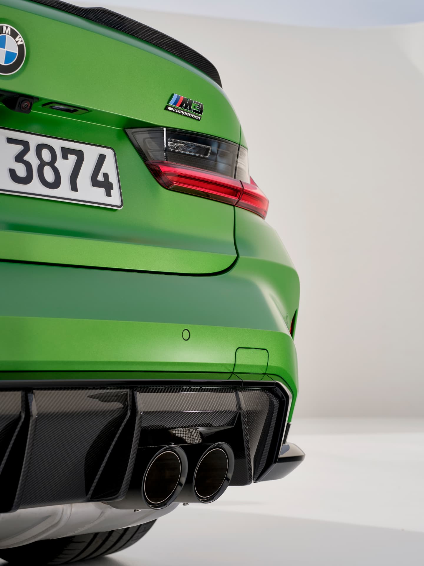 Quad exhaust outlets and carbon diffuser of the BMW M3 G80