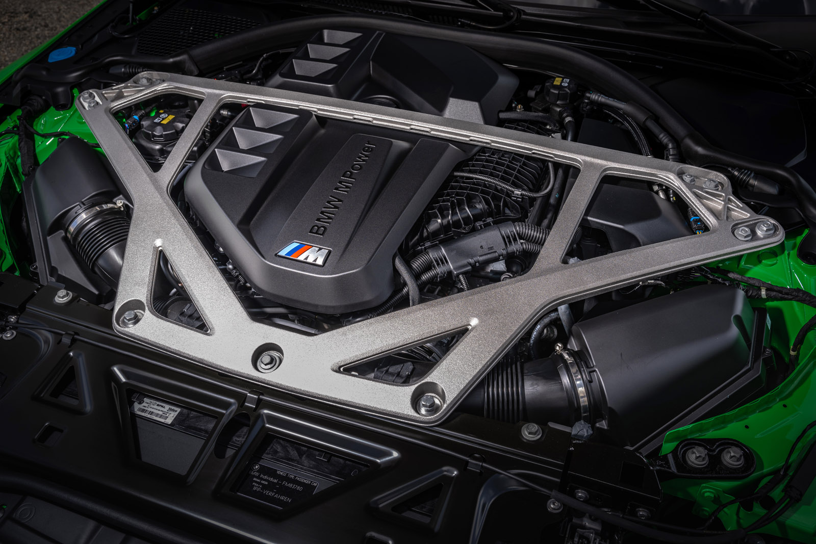 S58 engine bay of the BMW M3 G80 with strut brace and intake tract